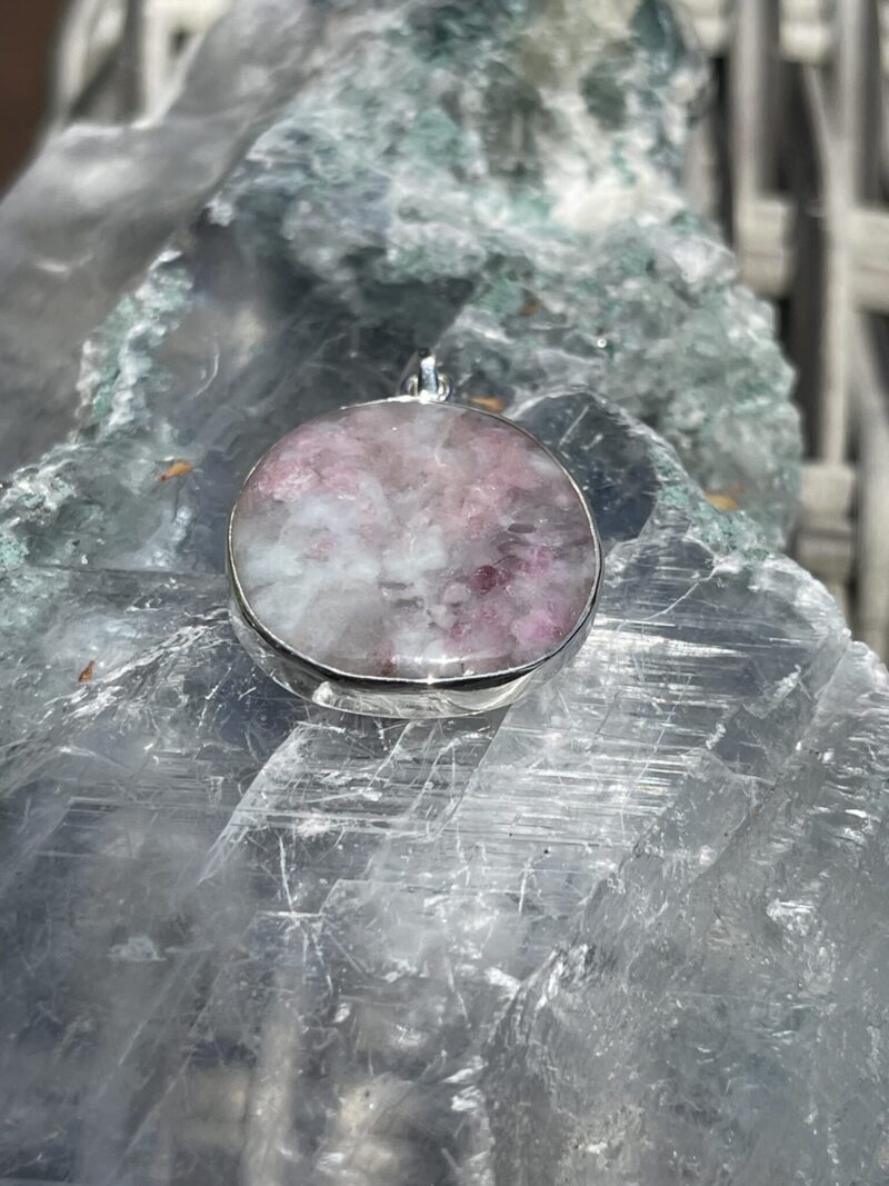 This is Round Pink Tourmaline in Quartz Pendant in Silver