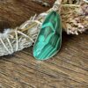 Malachite Pendant with Guardian Within – Strength and Protection Encased in Silver