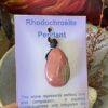 Rhodochrosite Pendant on Cord – A Heartfelt Connection