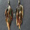 These are Nepalese bead feather earrings that add joy and freedom to your life