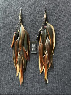 These are Nepalese bead feather earrings that add joy and freedom to your life