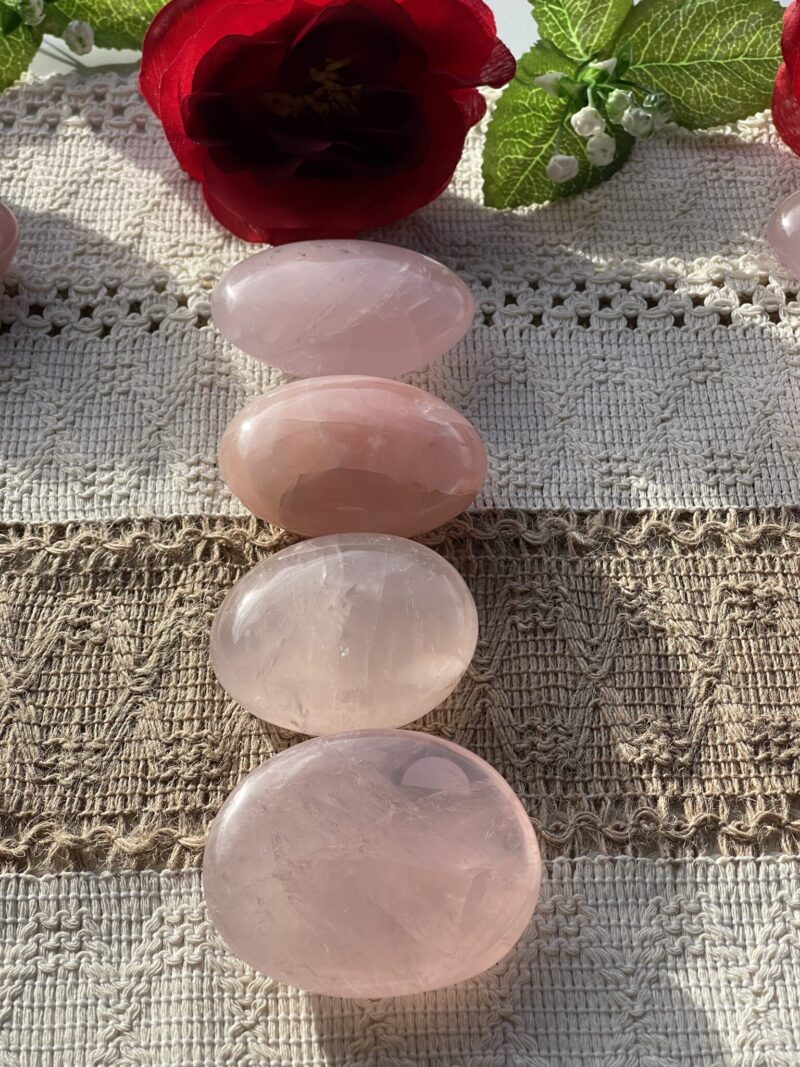 Elevate your energy and embrace love in all its forms with our Gorgeous Rose Quartz Palm Stone Selection