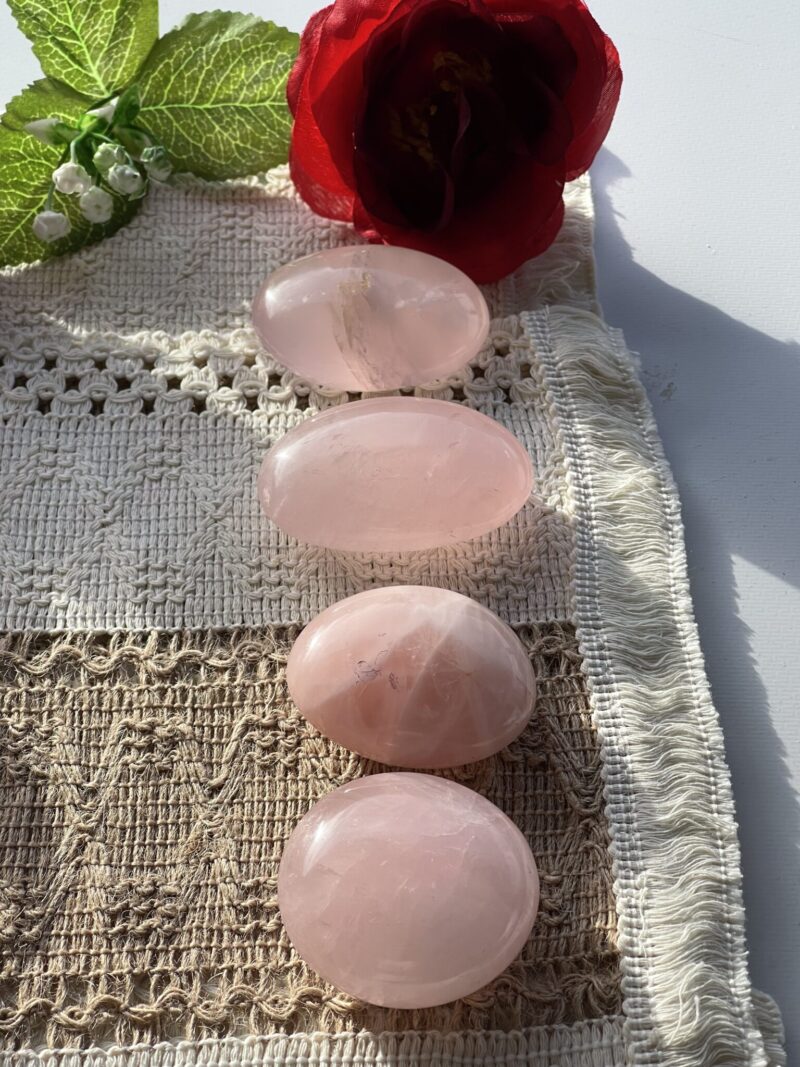 Elevate your energy and embrace love in all its forms with our Gorgeous Rose Quartz Palm Stone Selection