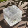 Grounding Brilliance: Rainbow Clear Quartz Cube (369g)